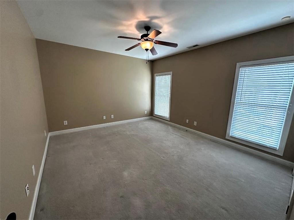 107 Savoy Place Calhoun, GA 30701 - Photo 21 of 32 a view of an empty room with a window