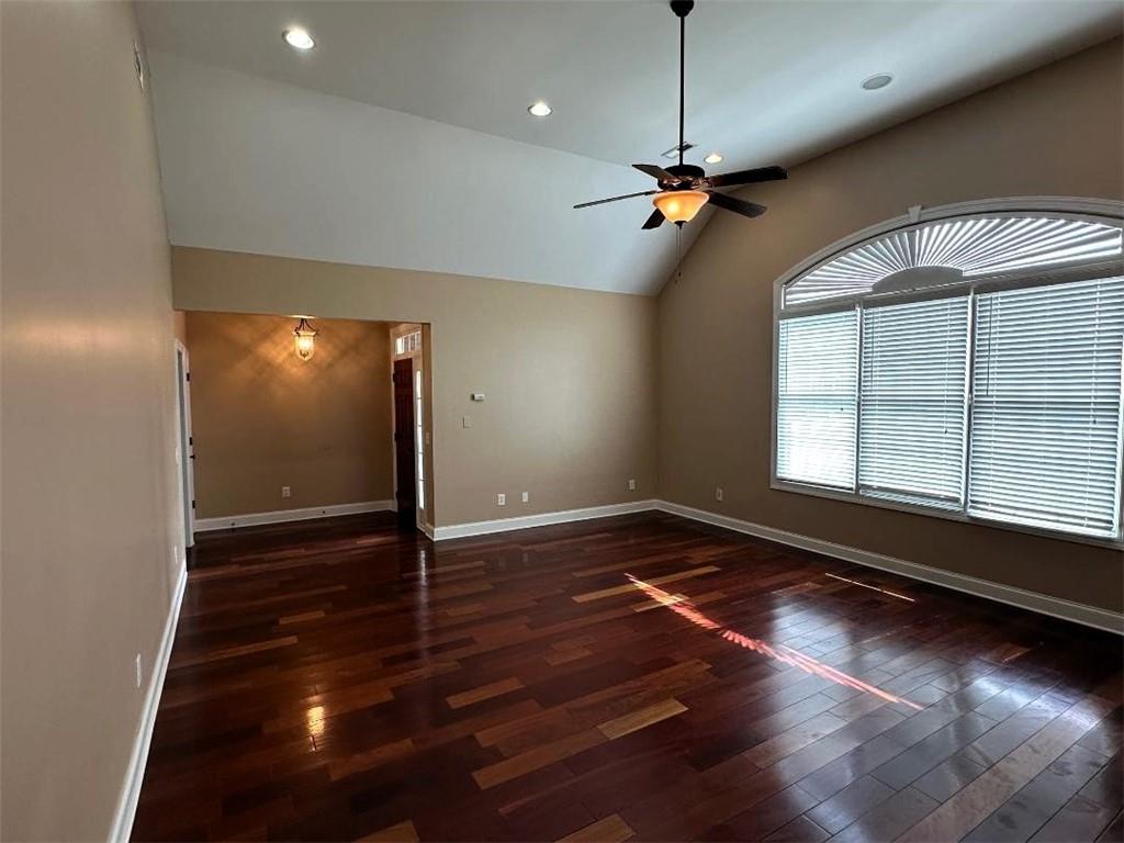 107 Savoy Place Calhoun, GA 30701 - Photo 10 of 32 a view of a livingroom with a ceiling fan and wooden floor