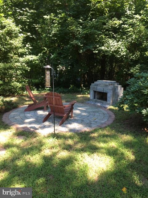 43 Kleis Road Severna Park, MD 21146 - Photo 35 of 39 Enjoy your privacy around the outdoor fireplace