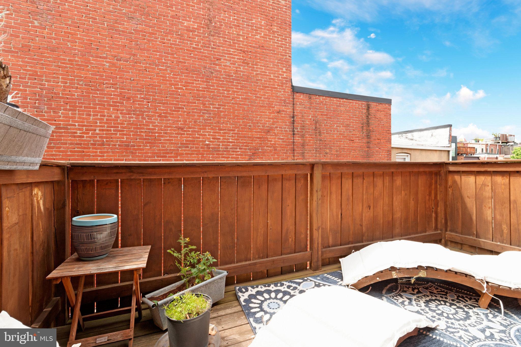 902 Westminster Street Northwest Washington, DC 20001 - Photo 5 of 20 a view of a balcony with chair