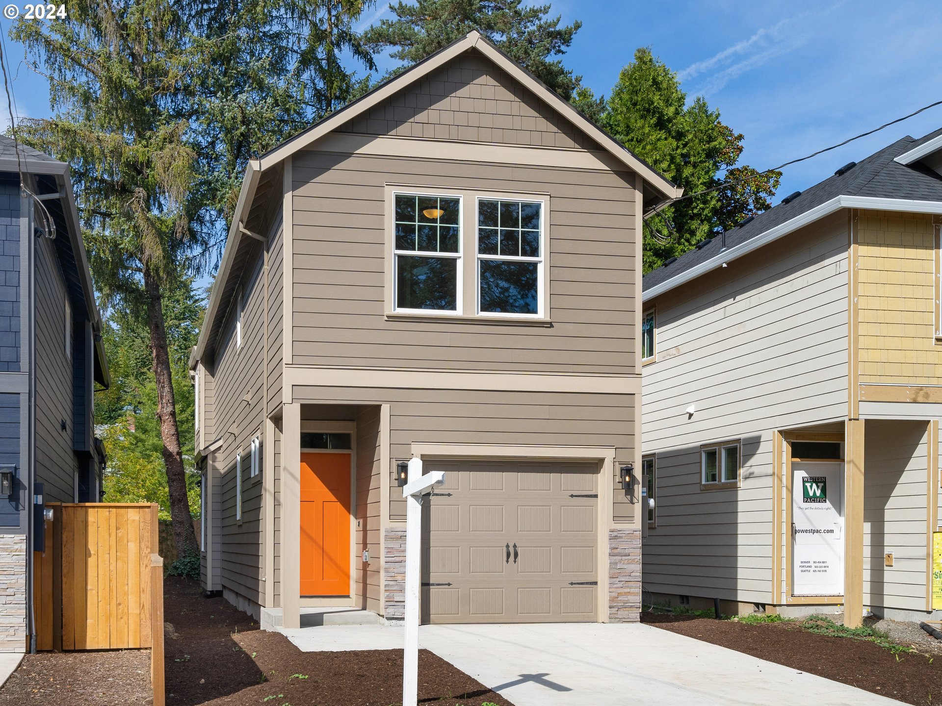 4435 Southeast Umatilla Street Portland, OR 97206 - Photo 1 of 48 a view of a house with a yard and potted plants
