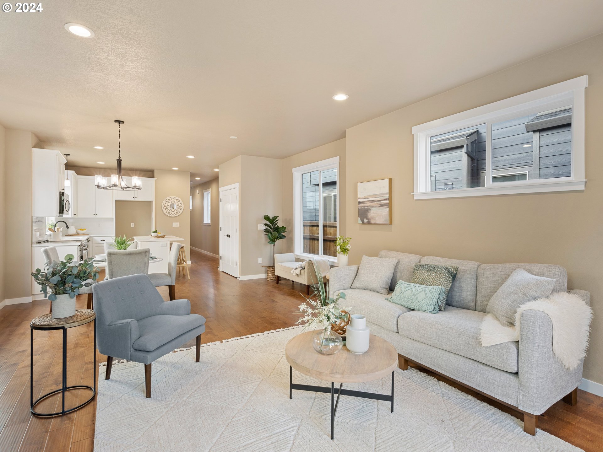 4435 Southeast Umatilla Street Portland, OR 97206 - Photo 15 of 48 a living room with furniture and a view of kitchen