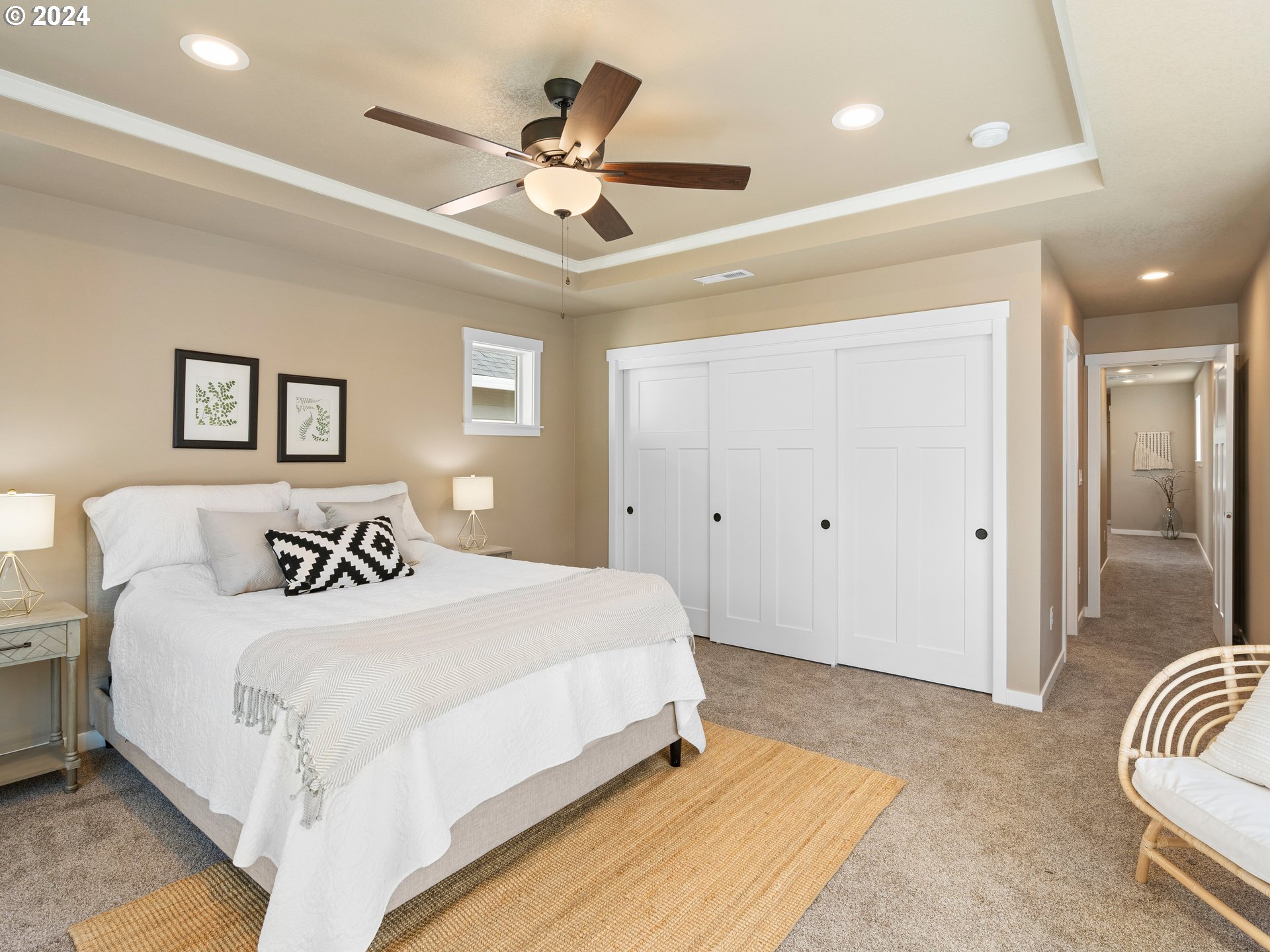 4435 Southeast Umatilla Street Portland, OR 97206 - Photo 22 of 48 a bedroom with a large bed and a chandelier