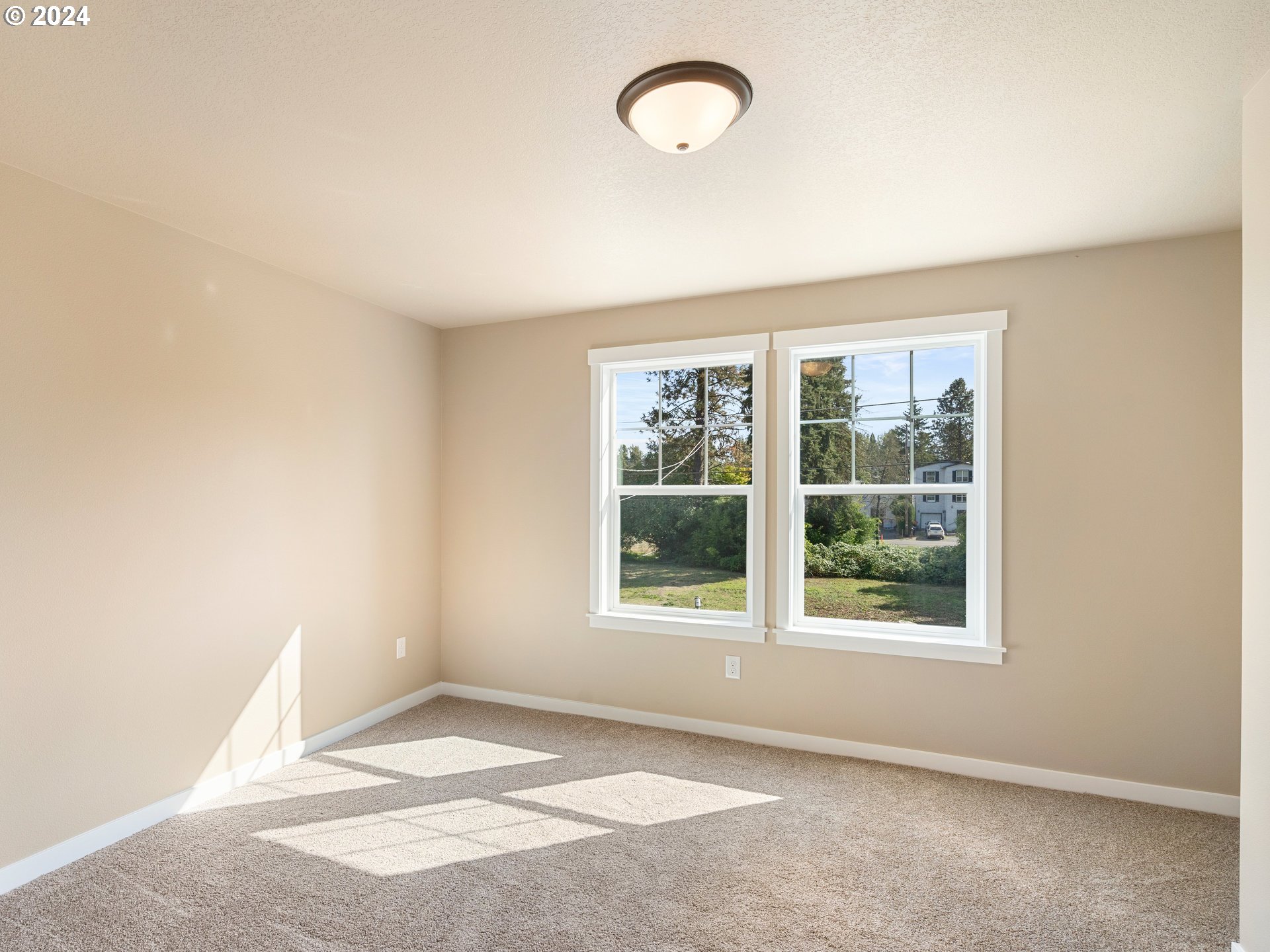 4435 Southeast Umatilla Street Portland, OR 97206 - Photo 27 of 48 an empty room with a window