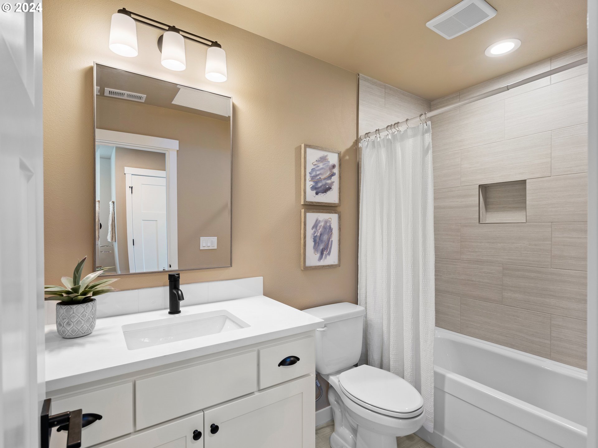 4435 Southeast Umatilla Street Portland, OR 97206 - Photo 29 of 48 a bathroom with a sink a toilet and shower