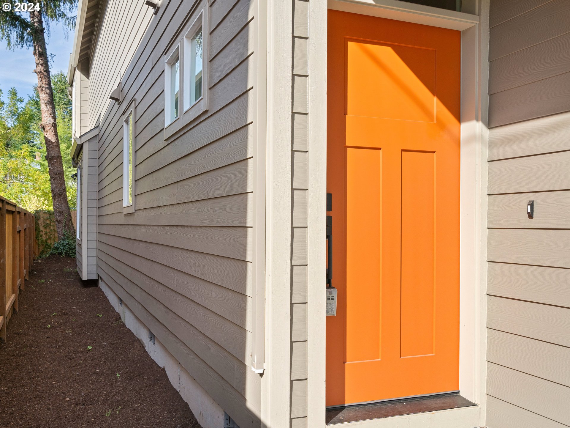 4435 Southeast Umatilla Street Portland, OR 97206 - Photo 3 of 48 a view of a house with a door and wooden door