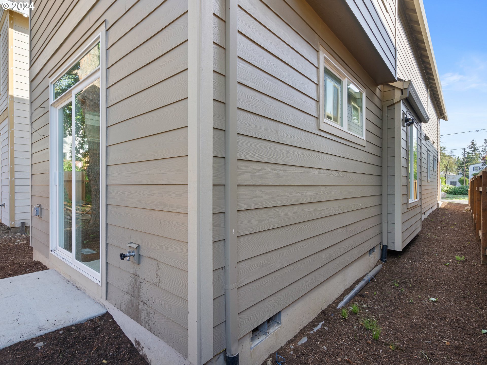 4435 Southeast Umatilla Street Portland, OR 97206 - Photo 36 of 48 a view of a house with a door