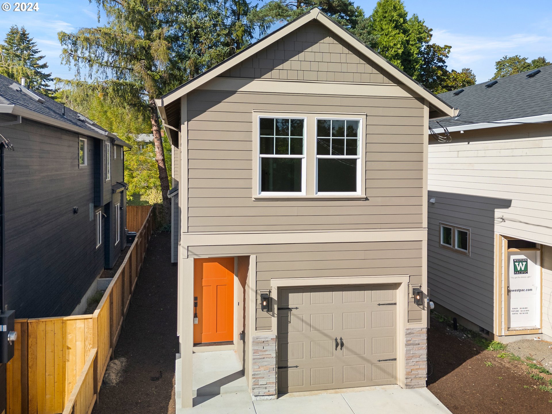 4435 Southeast Umatilla Street Portland, OR 97206 - Photo 47 of 48 a front view of a house with a garage