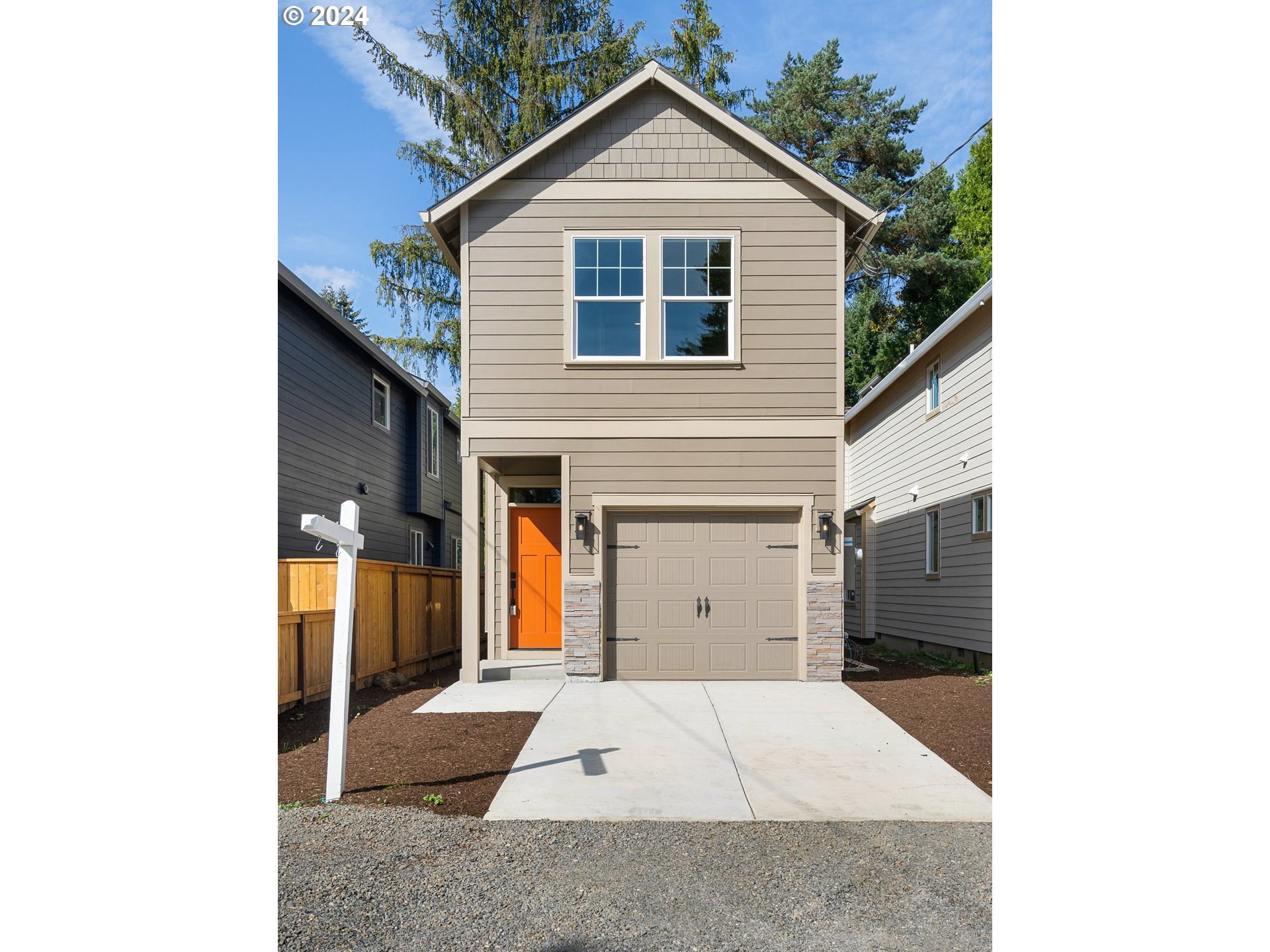 4435 Southeast Umatilla Street Portland, OR 97206 - Photo 48 of 48 a view of a house with a garage