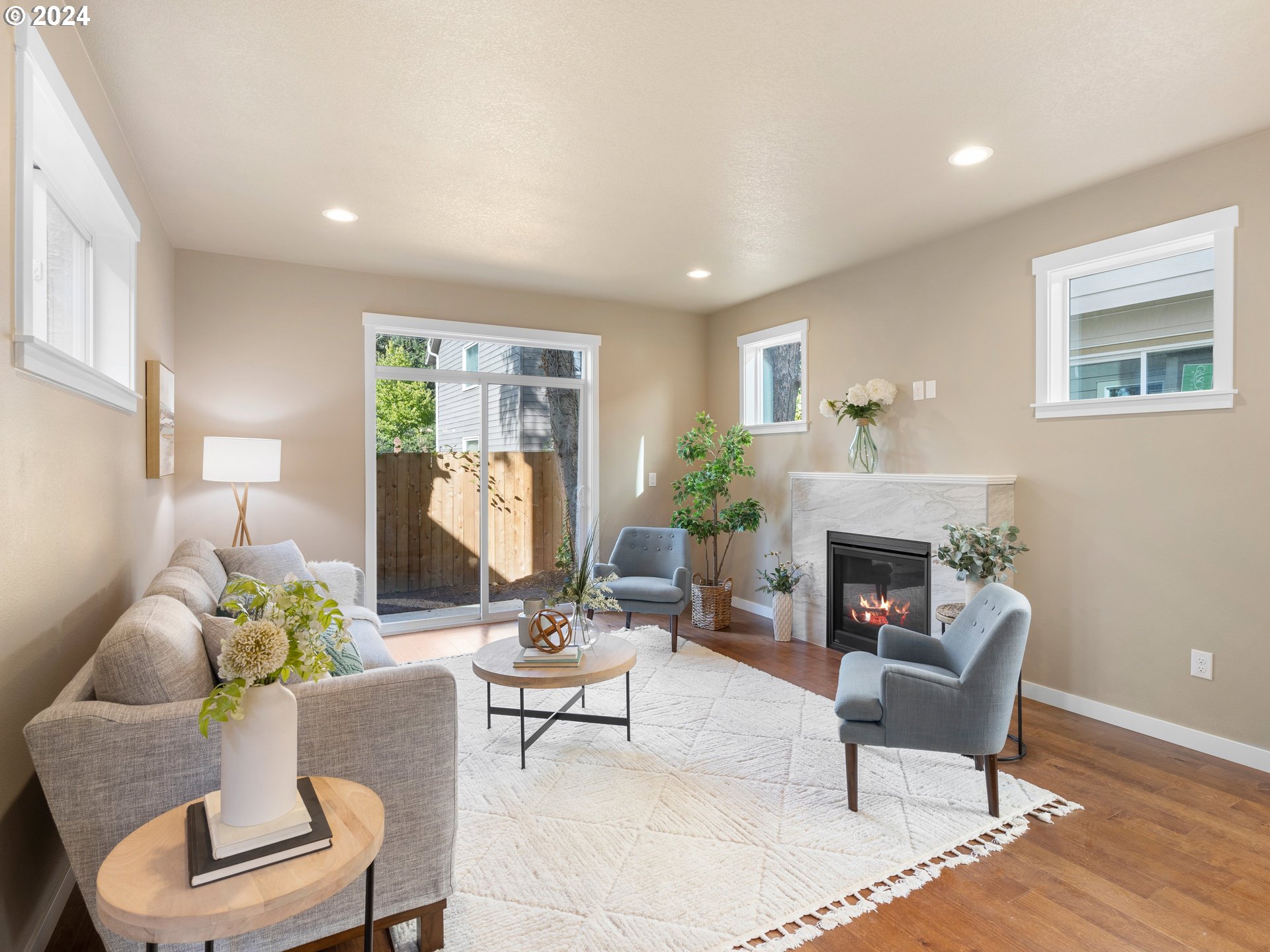 4435 Southeast Umatilla Street Portland, OR 97206 - Photo 6 of 48 a living room with furniture and a fireplace