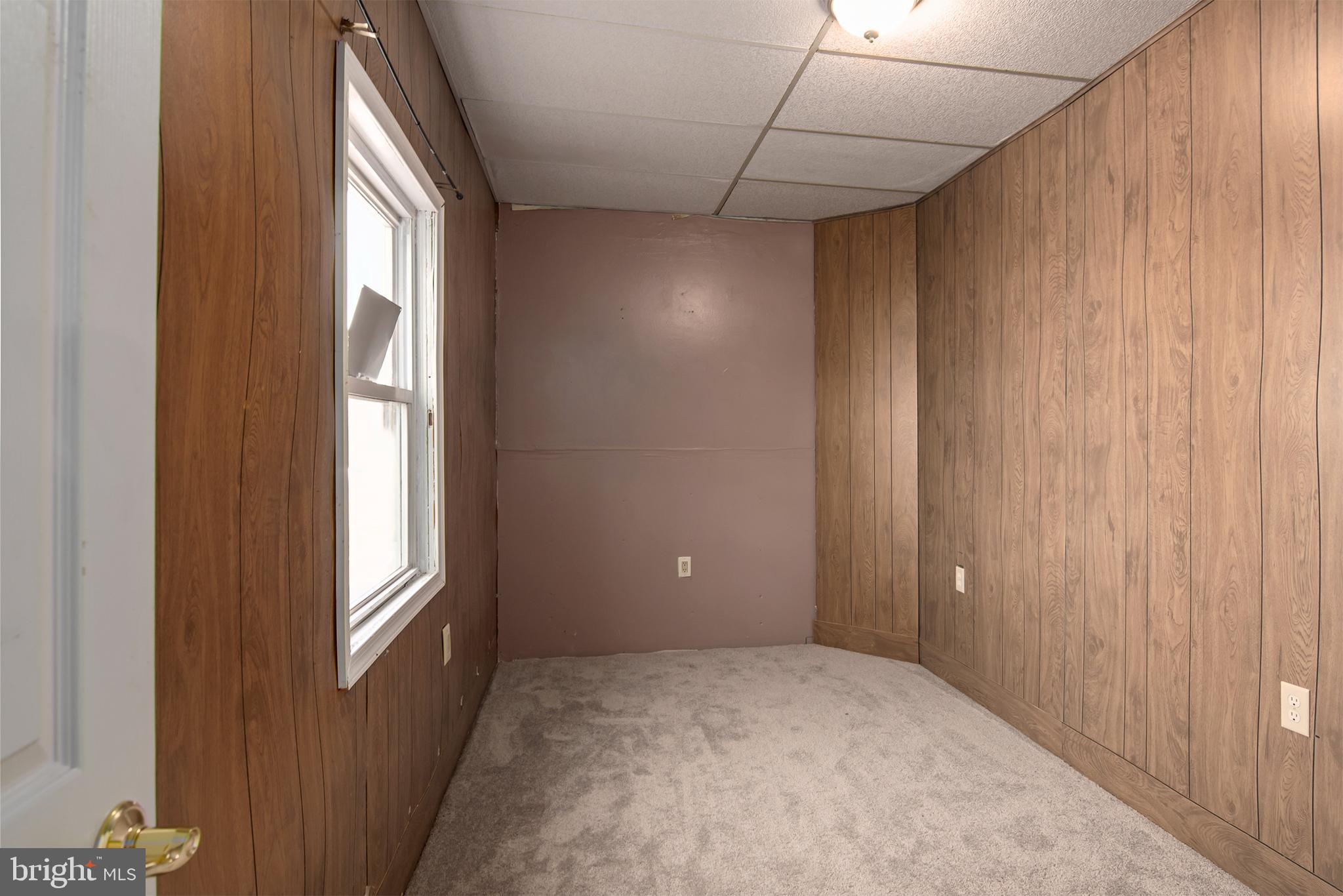 5880 Wheatley Church Road Rhodesdale, MD 21659 - Photo 16 of 27 a view of empty room with windows