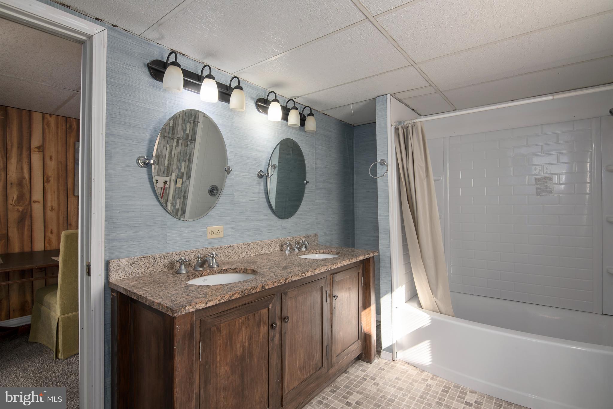 5880 Wheatley Church Road Rhodesdale, MD 21659 - Photo 24 of 27 a bathroom with a sink and a mirror