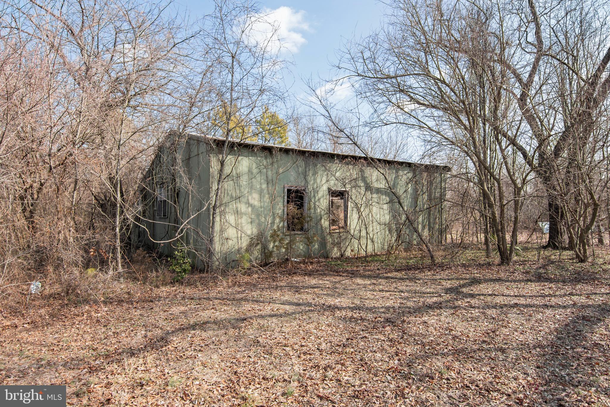 5880 Wheatley Church Road Rhodesdale, MD 21659 - Photo 26 of 27 a backyard of a house with lots of green space