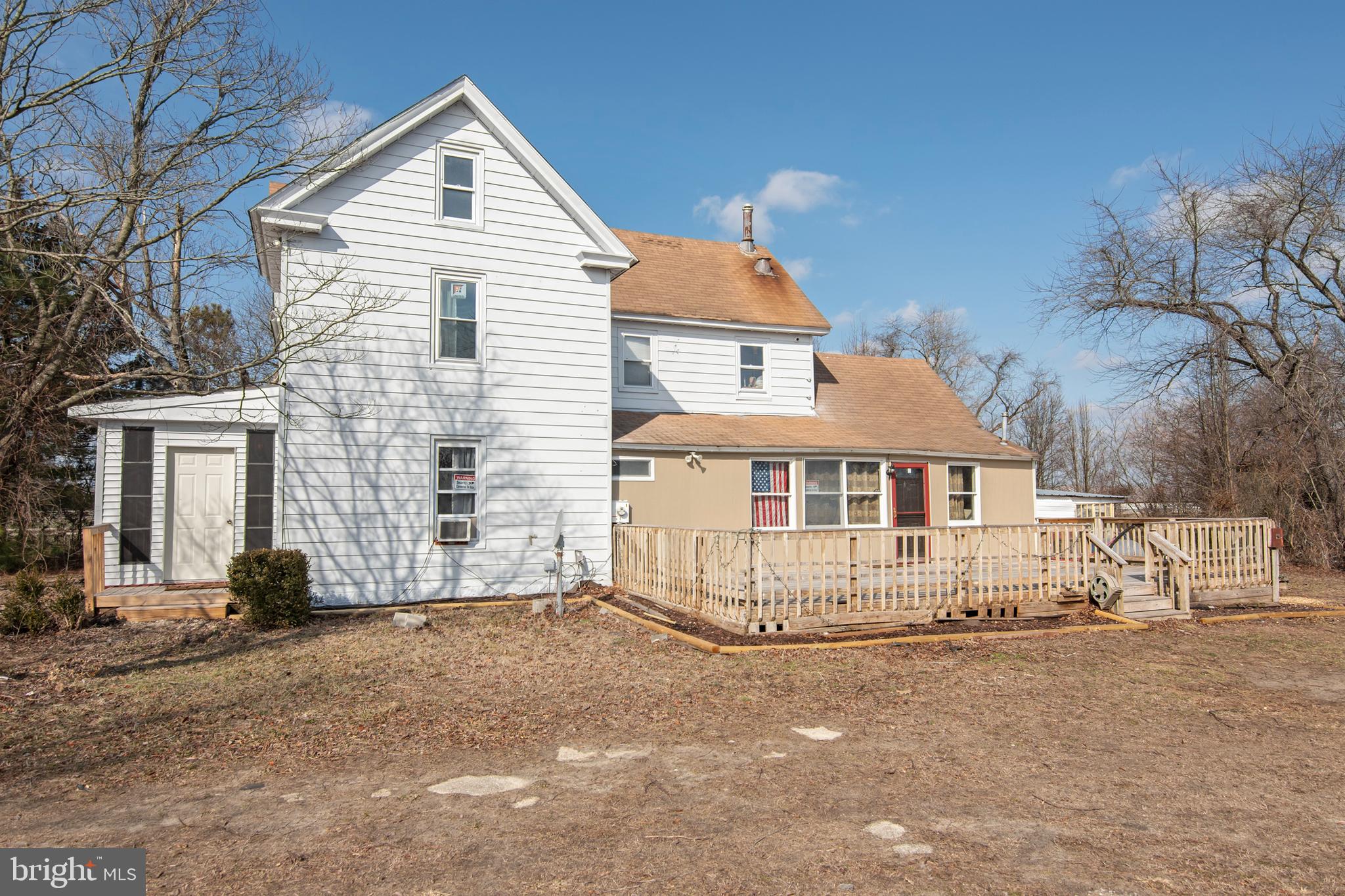 5880 Wheatley Church Road Rhodesdale, MD 21659 - Photo 3 of 27 a view of a house with a yard