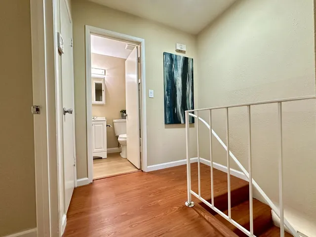 a view of entryway with wooden floor