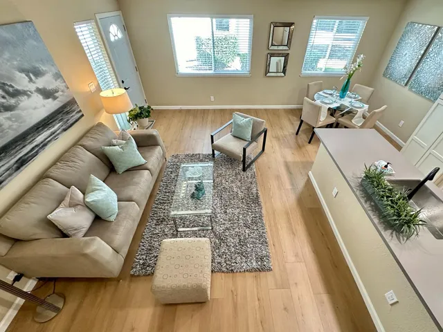 a living room with furniture and a couch