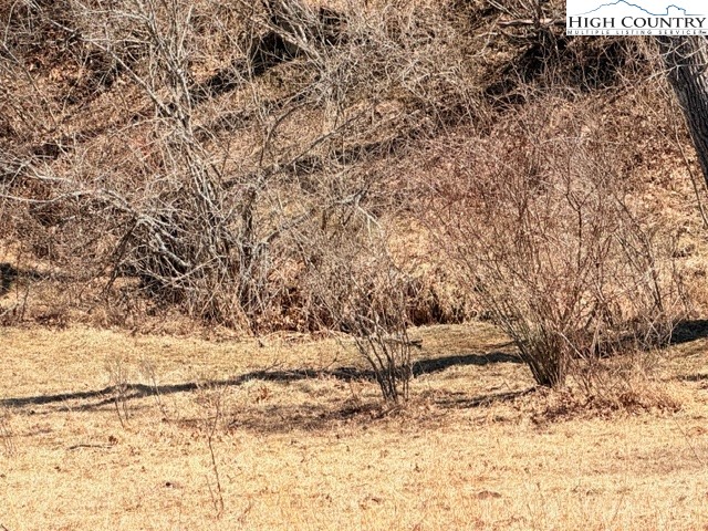 13.518 Landmark Church Road Lansing, NC 28643 - Photo 13 of 31 a view of snow on the road