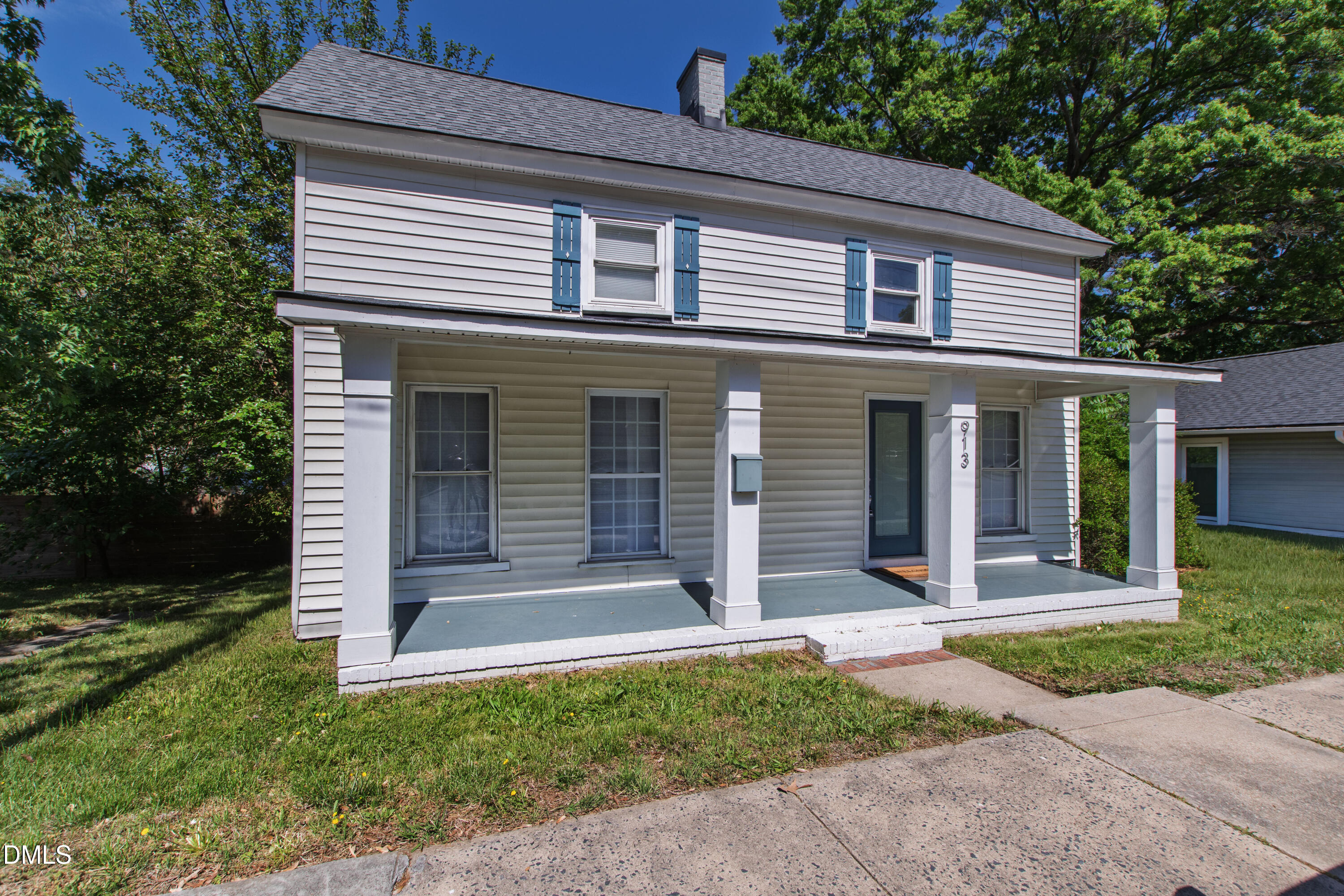 913 Washington Street Durham, NC 27701 - Photo 1 of 37 a front view of a house with a porch