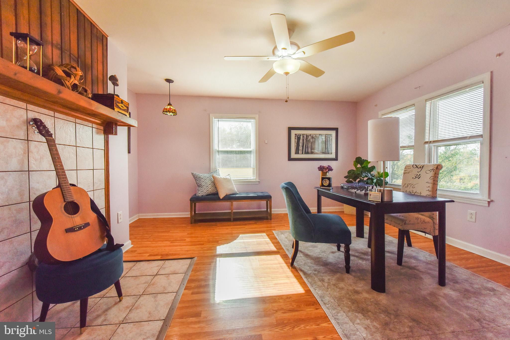 19 Harrisonville Lake Road Pilesgrove, NJ 08098 - Photo 11 of 44 a view of a livingroom with furniture and a window