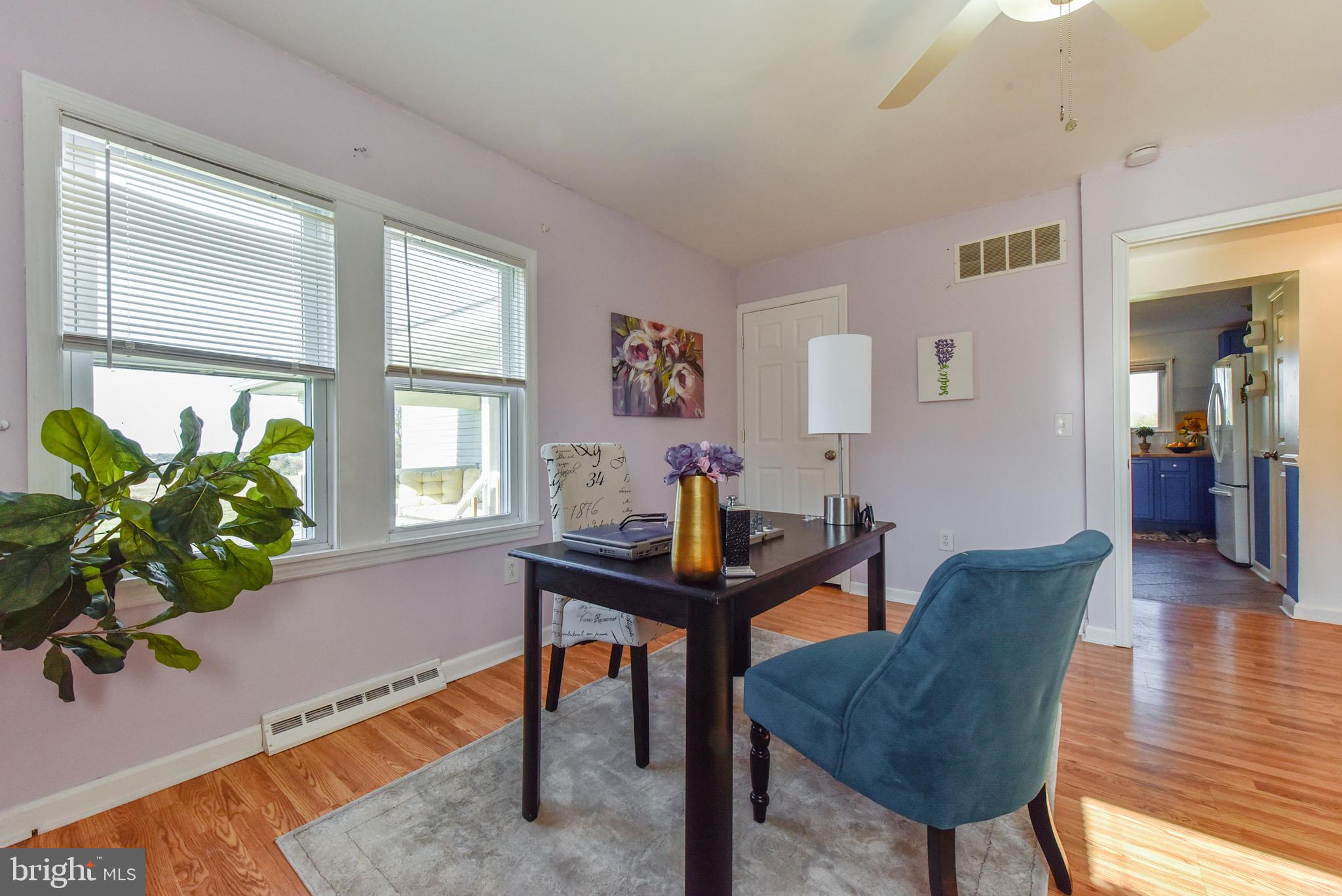 19 Harrisonville Lake Road Pilesgrove, NJ 08098 - Photo 12 of 44 a workspace with furniture and a potted plant