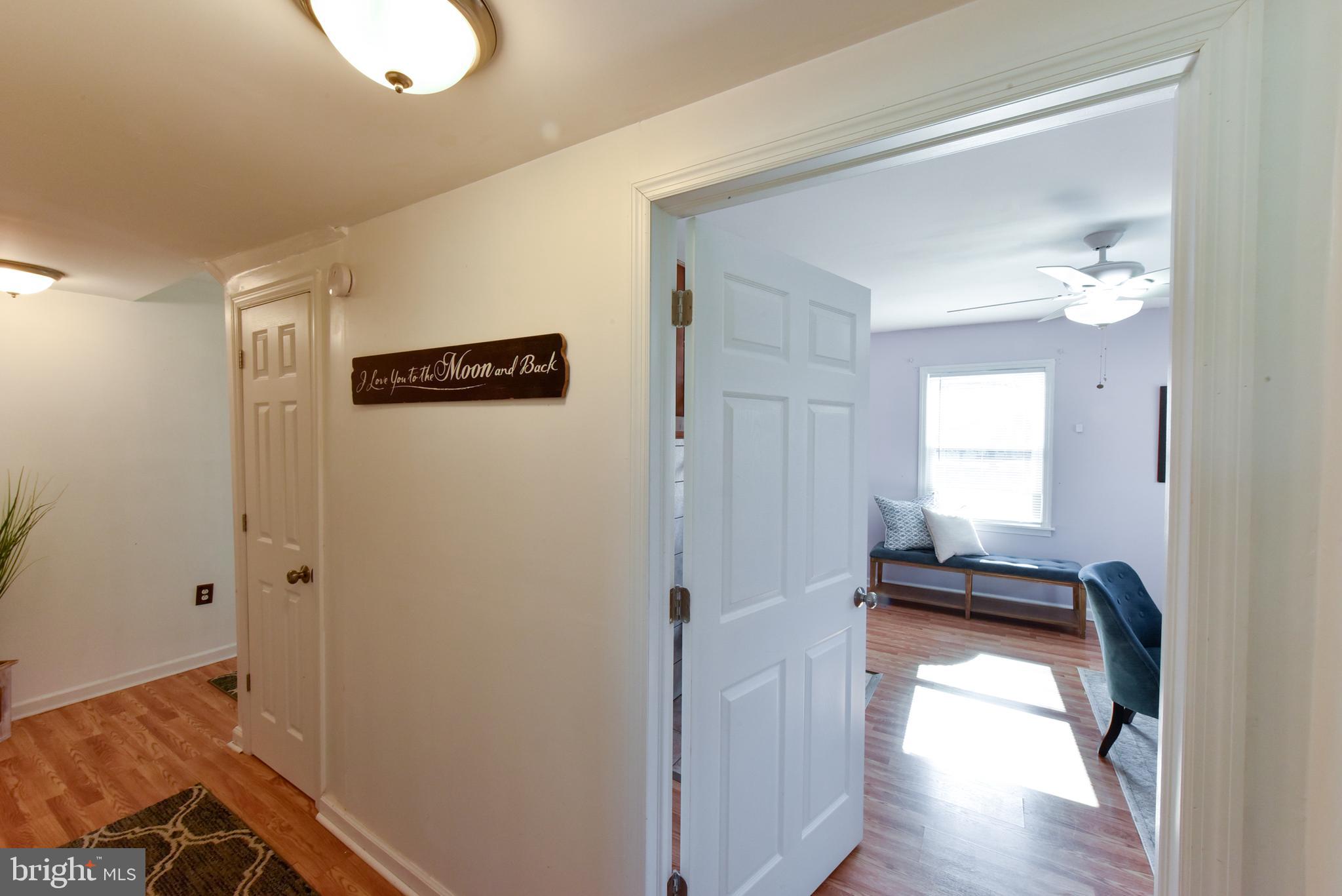19 Harrisonville Lake Road Pilesgrove, NJ 08098 - Photo 15 of 44 a view of a room with wooden floor and staircase