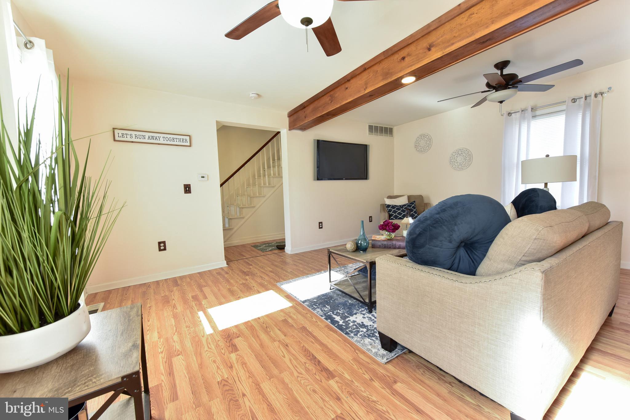 19 Harrisonville Lake Road Pilesgrove, NJ 08098 - Photo 17 of 44 a living room with furniture and a large window