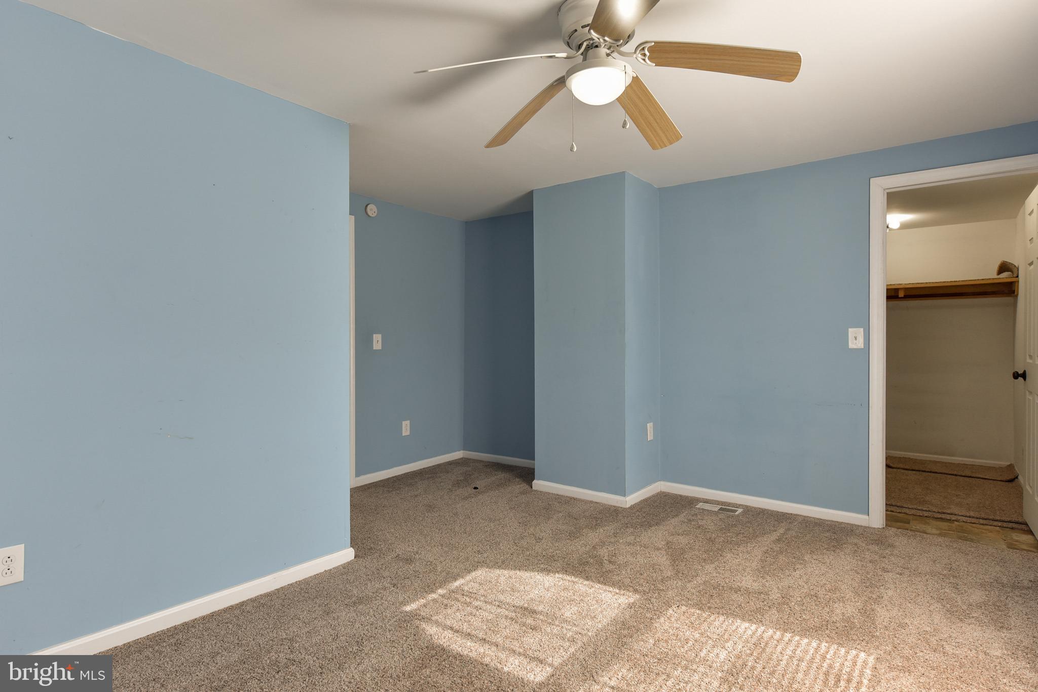 19 Harrisonville Lake Road Pilesgrove, NJ 08098 - Photo 21 of 44 an empty room with closet and a chandelier fan
