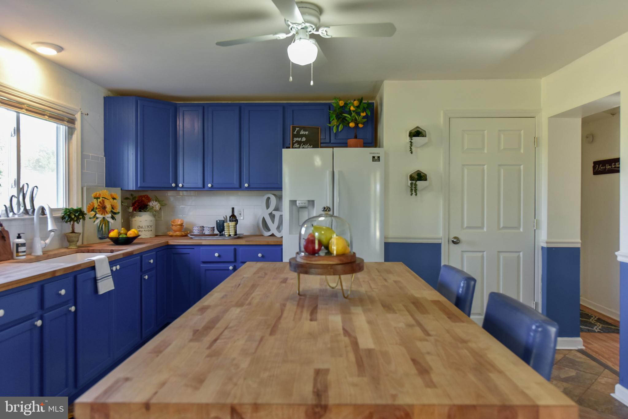 19 Harrisonville Lake Road Pilesgrove, NJ 08098 - Photo 4 of 44 a view of a kitchen with a sink and cabinet
