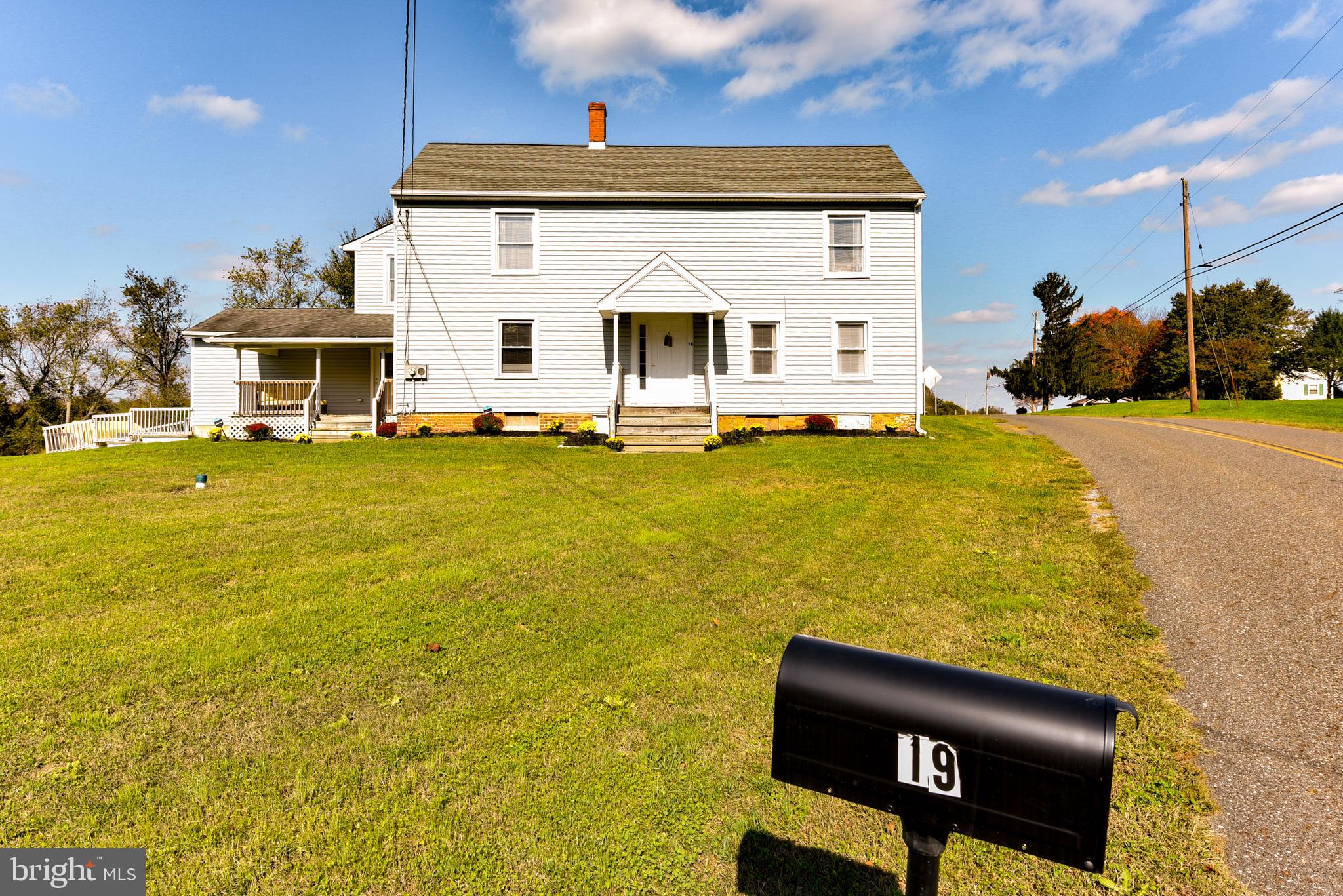 19 Harrisonville Lake Road Pilesgrove, NJ 08098 - Photo 33 of 44 a front view of house with yard