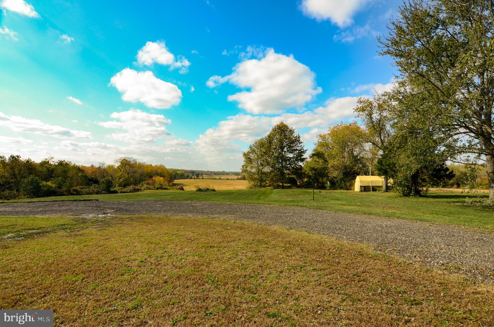 19 Harrisonville Lake Road Pilesgrove, NJ 08098 - Photo 38 of 44 a view of a field with an ocean