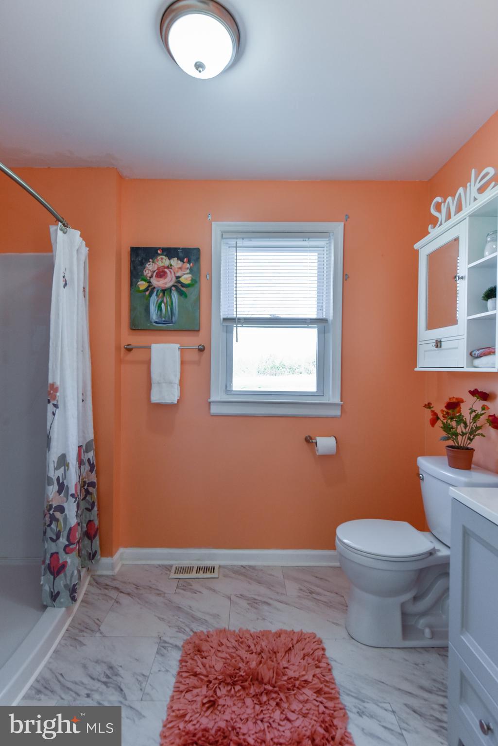 19 Harrisonville Lake Road Pilesgrove, NJ 08098 - Photo 9 of 44 a bathroom with a toilet