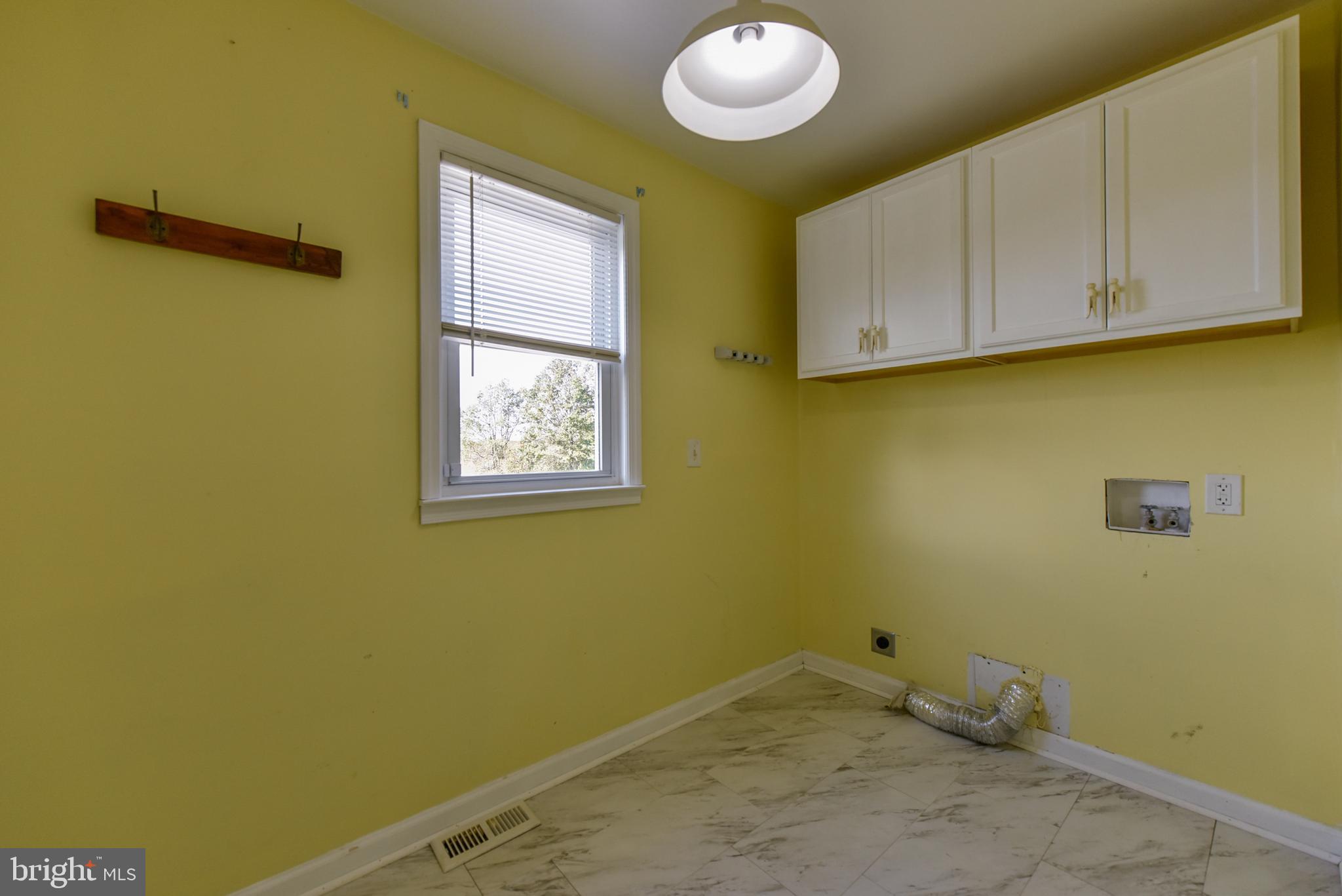 19 Harrisonville Lake Road Pilesgrove, NJ 08098 - Photo 10 of 44 a view of a small space with wooden floor and cabinets