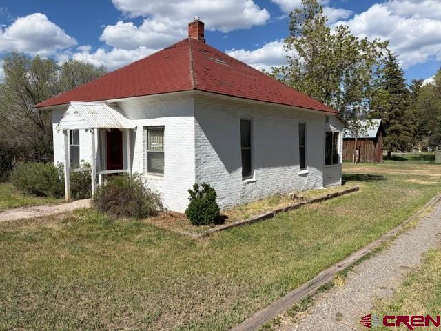 116 South Mary Street Ridgway, CO 81432 - Photo 16 of 23 a front view of house with yard