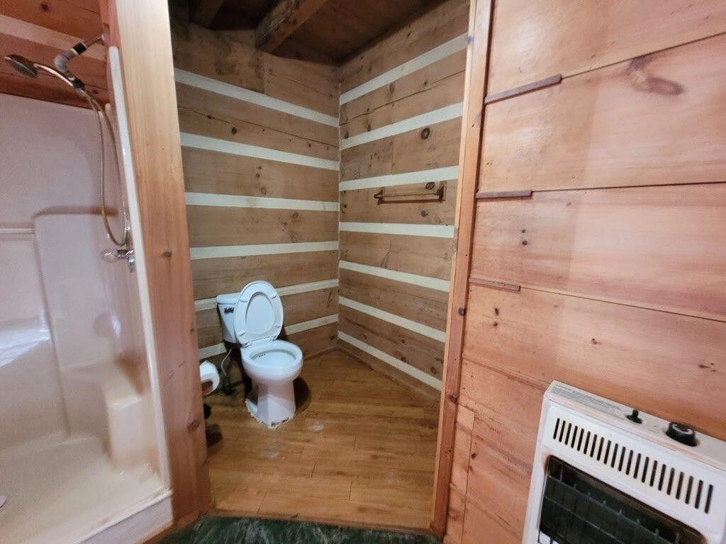 145 Crawford Stiles Road Farner, TN 37333 - Photo 11 of 45 a bathroom with a toilet and a shower