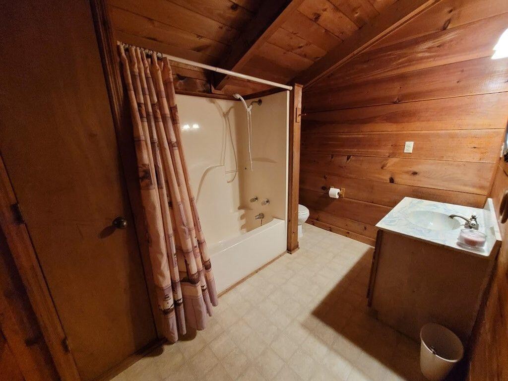 145 Crawford Stiles Road Farner, TN 37333 - Photo 14 of 45 a bathroom with a tub and shower