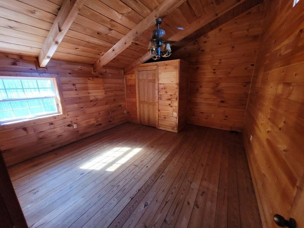 145 Crawford Stiles Road Farner, TN 37333 - Photo 16 of 45 a view of an empty room with wooden floor and a window