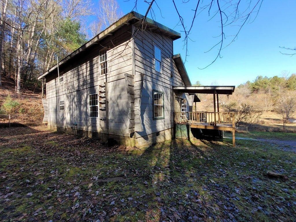 145 Crawford Stiles Road Farner, TN 37333 - Photo 25 of 45 a view of a house with backyard and sitting area