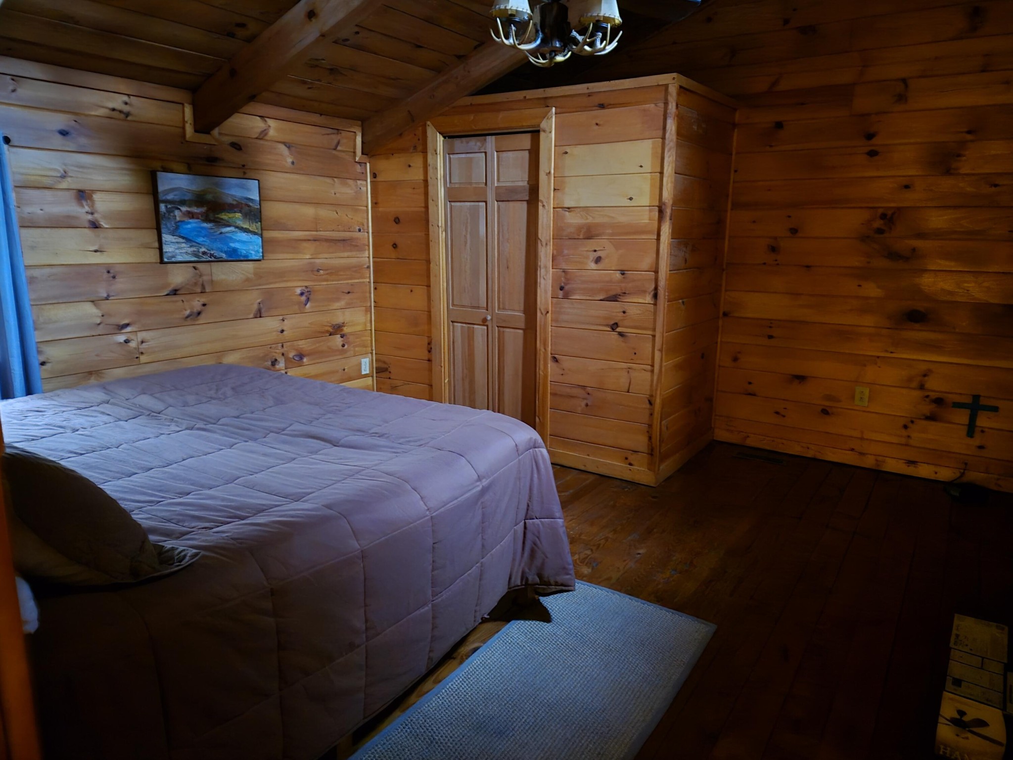 145 Crawford Stiles Road Farner, TN 37333 - Photo 6 of 45 a bed sitting in a bedroom next to a cabinet