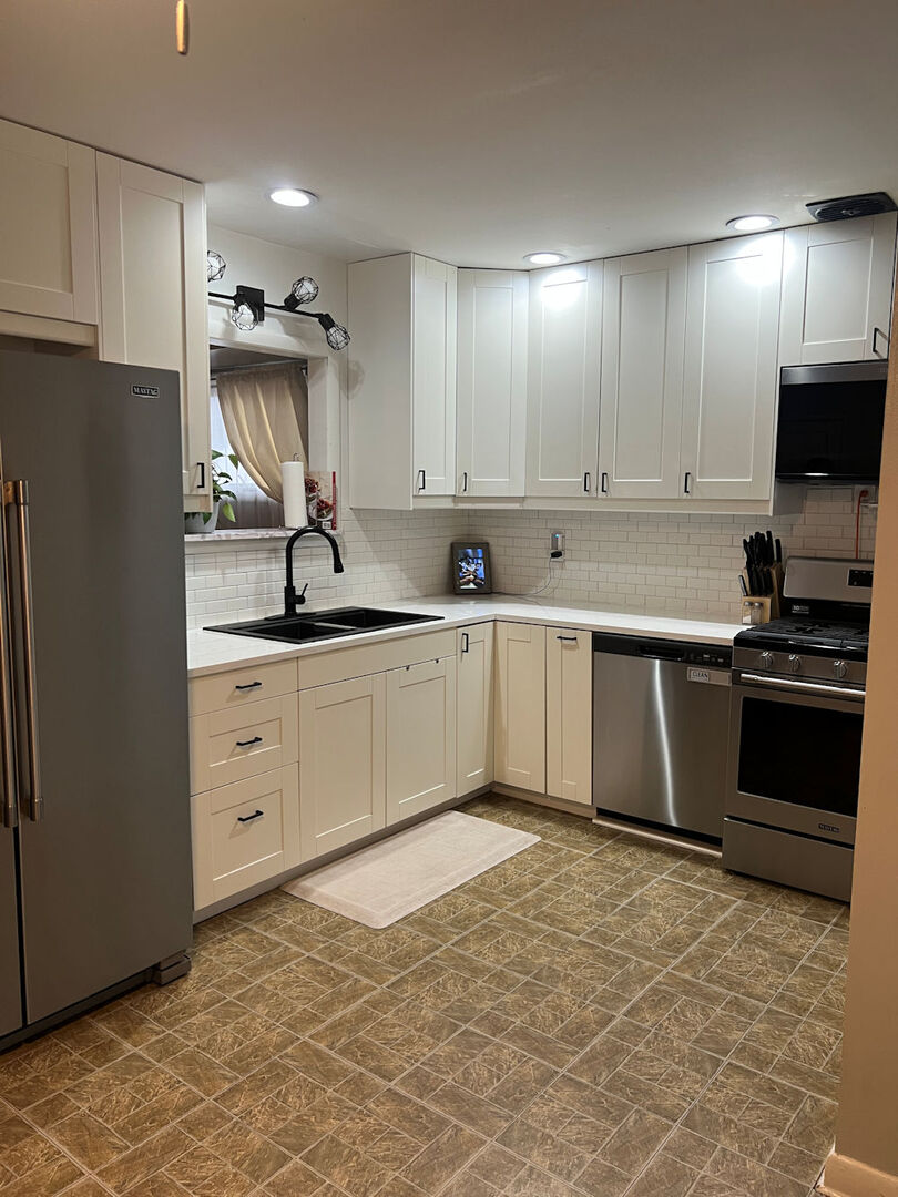 1170 Westview Drive Rochelle, IL 61068 - Photo 2 of 12 a kitchen with a sink stove and refrigerator