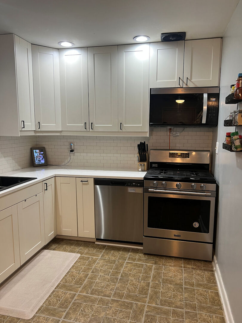 1170 Westview Drive Rochelle, IL 61068 - Photo 4 of 12 a kitchen with a stove and a sink