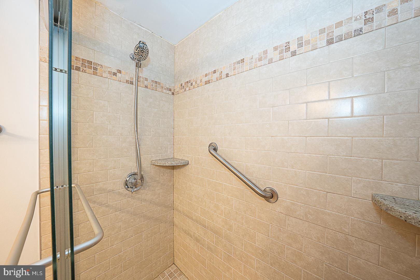 1919 Chestnut Street, Unit 1722 Philadelphia, PA 19103 - Photo 14 of 26 a bathroom with a shower