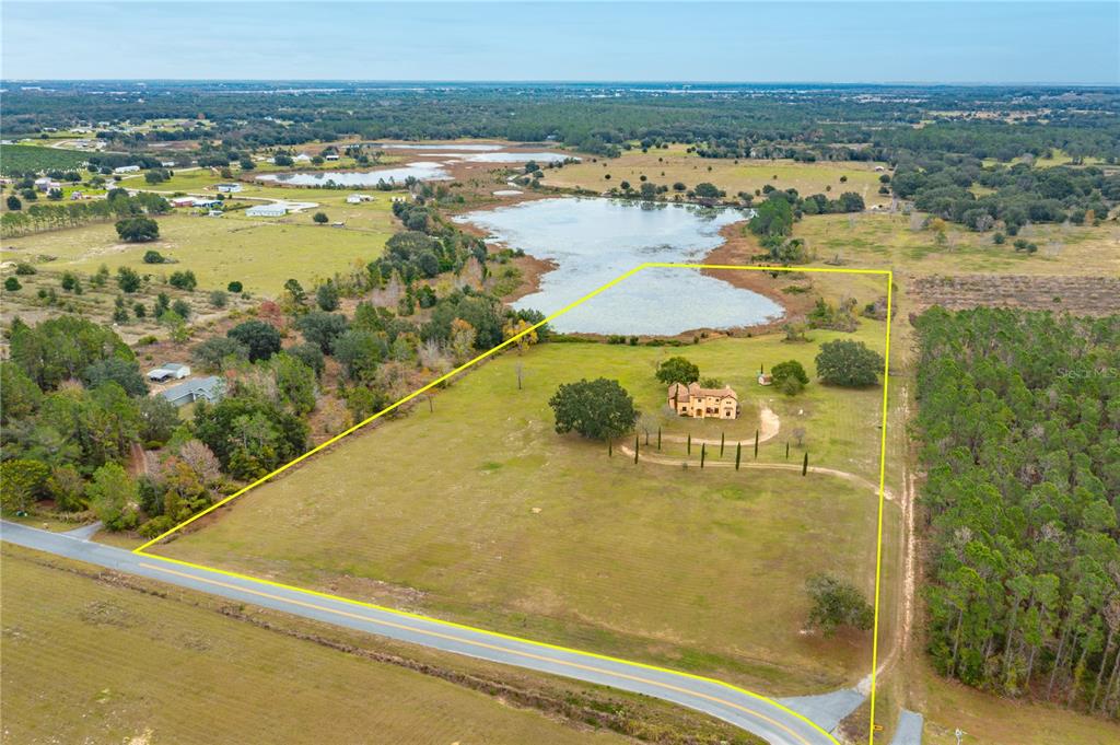 24540 Turkey Lake Road Howey-in-the-Hills, FL 34737 - Photo 41 of 42 a view of an ocean and mountain