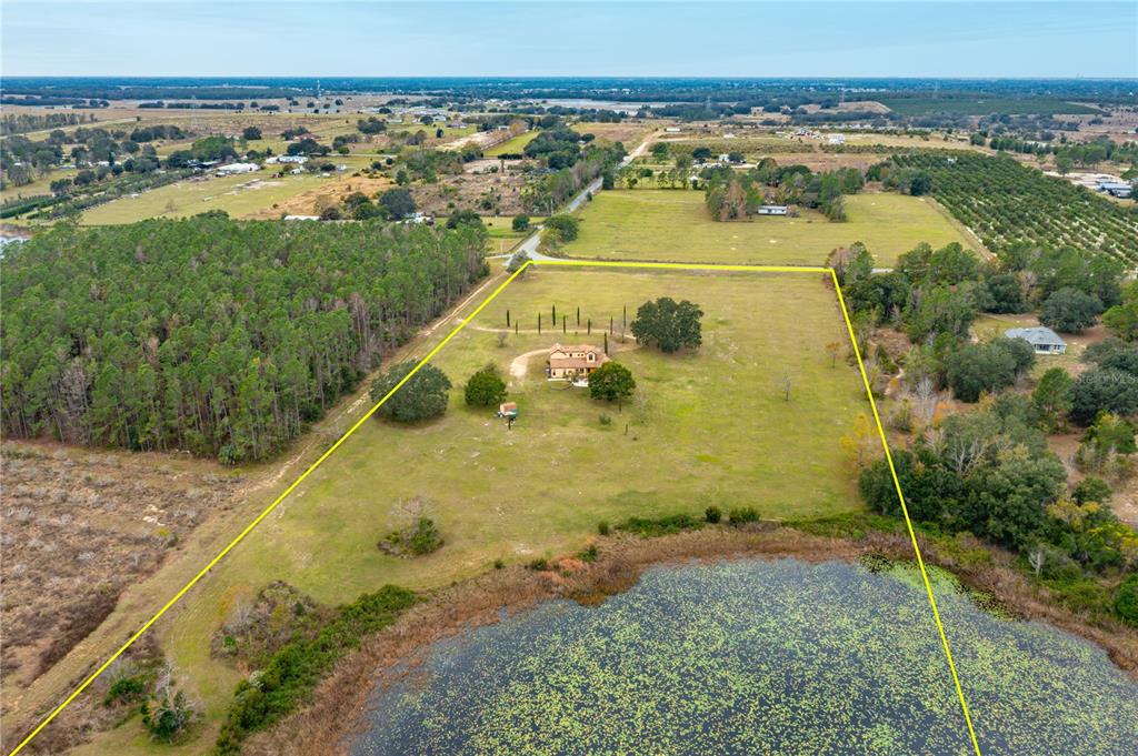 24540 Turkey Lake Road Howey-in-the-Hills, FL 34737 - Photo 42 of 42 a view of a water with an outdoor space