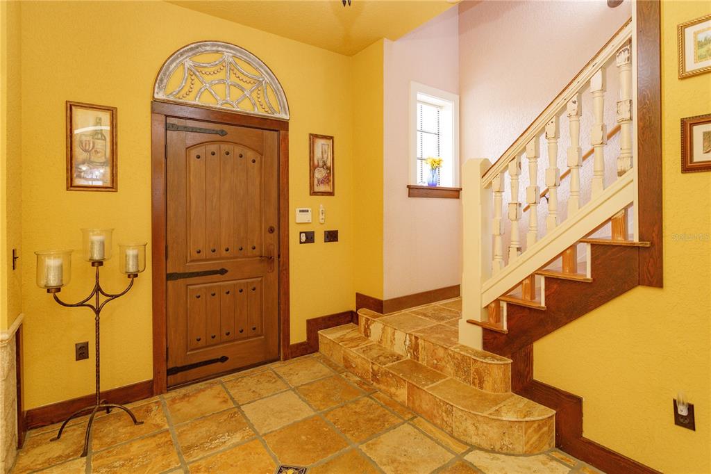 24540 Turkey Lake Road Howey-in-the-Hills, FL 34737 - Photo 5 of 42 a view of entryway with a front door