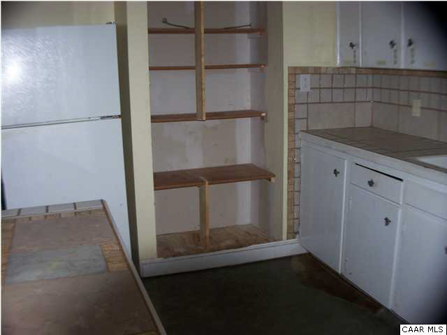 93 Logtrac Road Stanardsville, VA 22973 - Photo 13 of 20 a view of storage and utility room with wooden floor