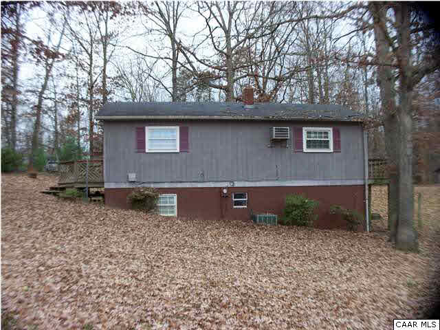 93 Logtrac Road Stanardsville, VA 22973 - Photo 16 of 20 a front view of a house with garden