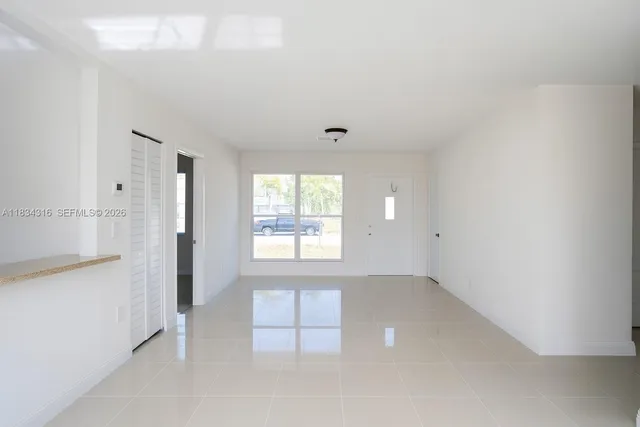 an empty room with windows