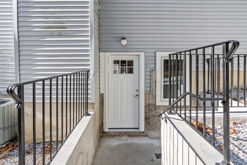 80 Emer Road, Unit 1 Marlborough, MA 01752 - Photo 11 of 11 a view of a balcony