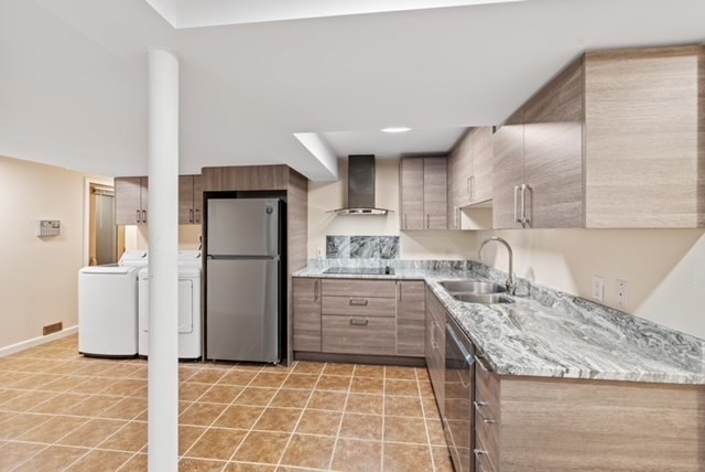 80 Emer Road, Unit 1 Marlborough, MA 01752 - Photo 5 of 11 a kitchen with a refrigerator sink and cabinets