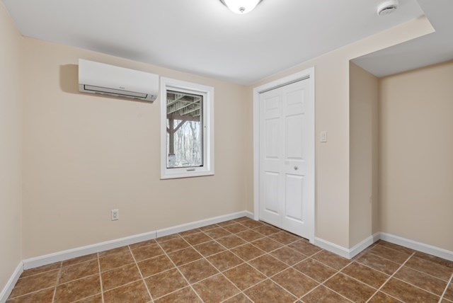 80 Emer Road, Unit 1 Marlborough, MA 01752 - Photo 6 of 11 a view of an empty room